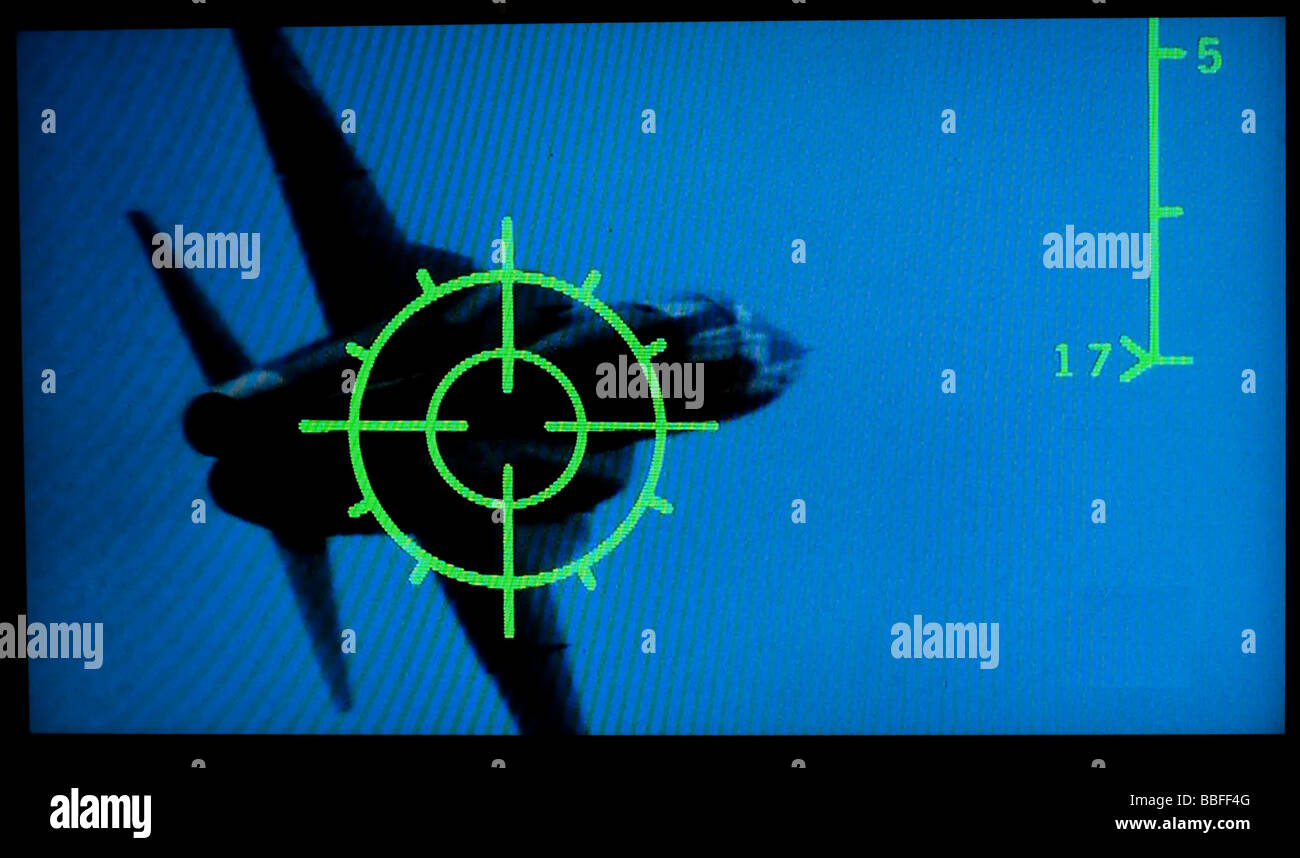 frame from movie Topgun showing a fighter jet in crosshairs of another fighter Stock Photo