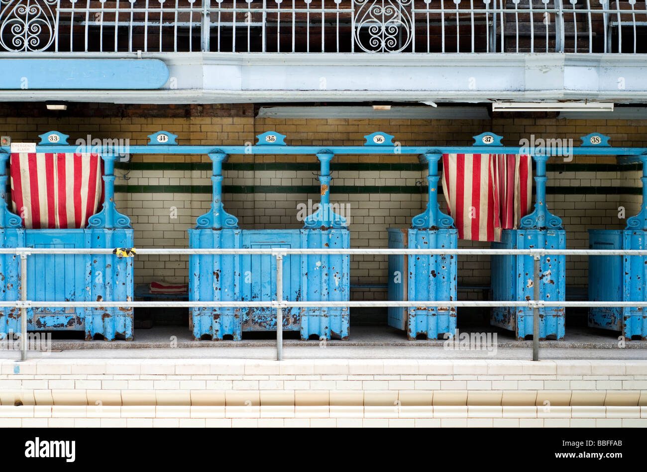 Changing cubicles in the first class male pool at Victoria Baths in Manchester, England, UK, prior to the building's restoration Stock Photo