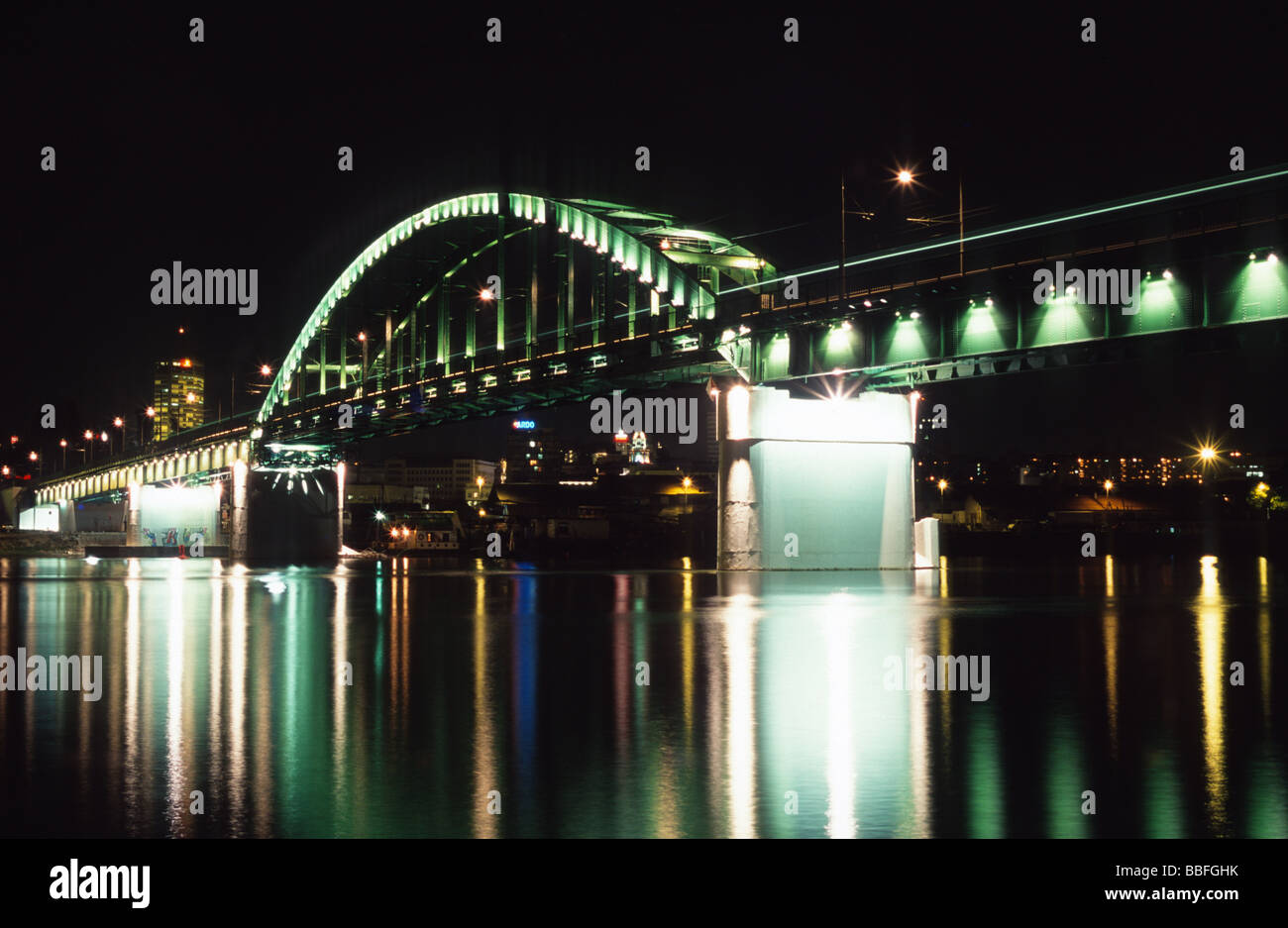 Illuminated Ulica Zemunski bridge crossing the Sava river at night in Belgrade, Serbia, Balkans Stock Photo