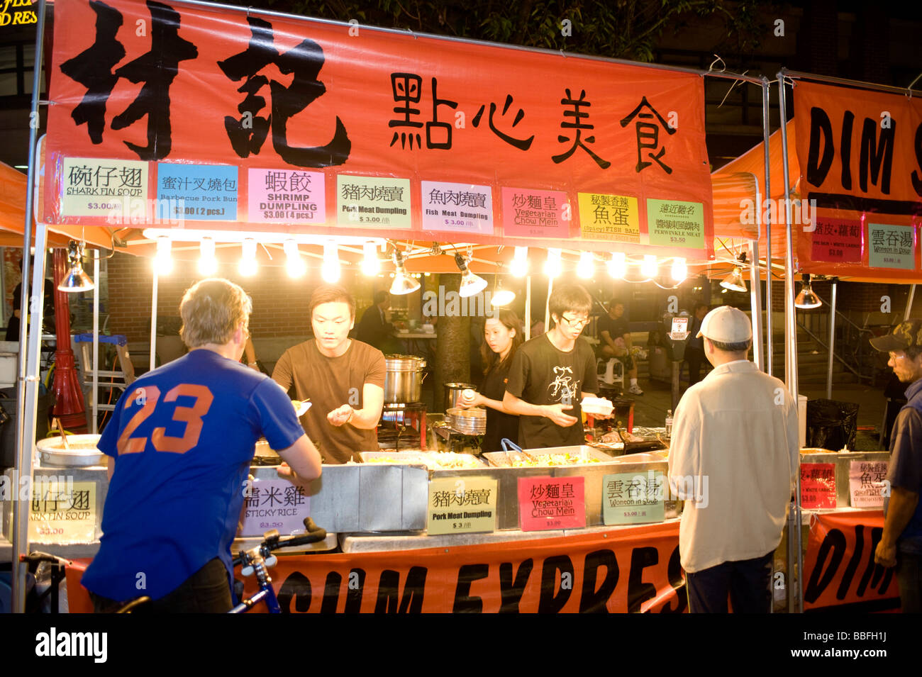 A food stand at the Downtown Vancouver Chinatown night market. Vancouver BC, Canada Stock Photo