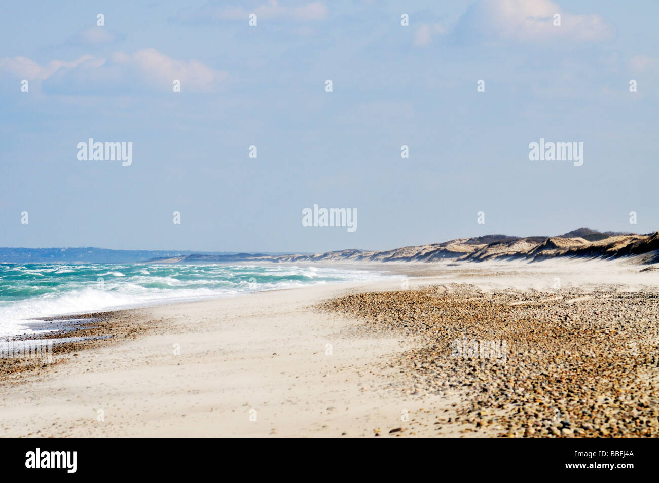 Rough seas with waves crashing on shoreline at 'Sandy Neck Beach' in Sandwich and Barnstable 'Cape Cod' USA Stock Photo