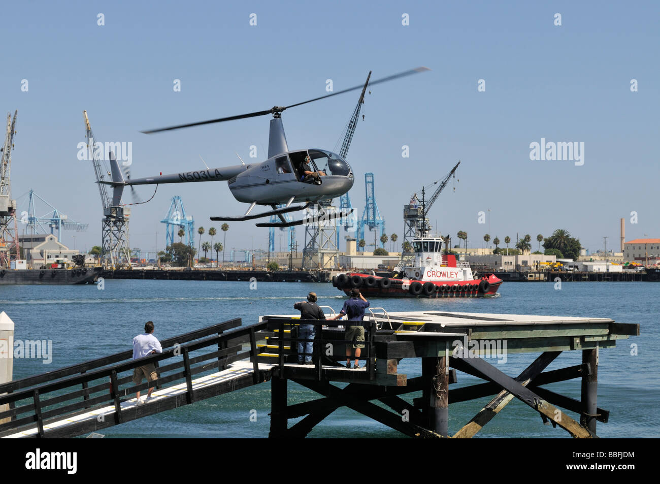 Small helicopter type Robinson R22, a two-bladed, single-engine light utility helicopter manufactured by Robinson Helicopter Stock Photo