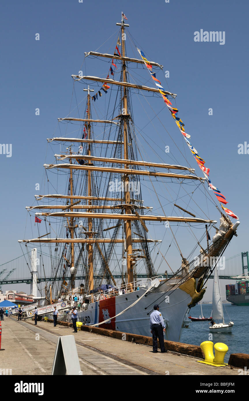 USCG Barque Eagle docked along the main channel of Port of Los Angeles Stock Photo