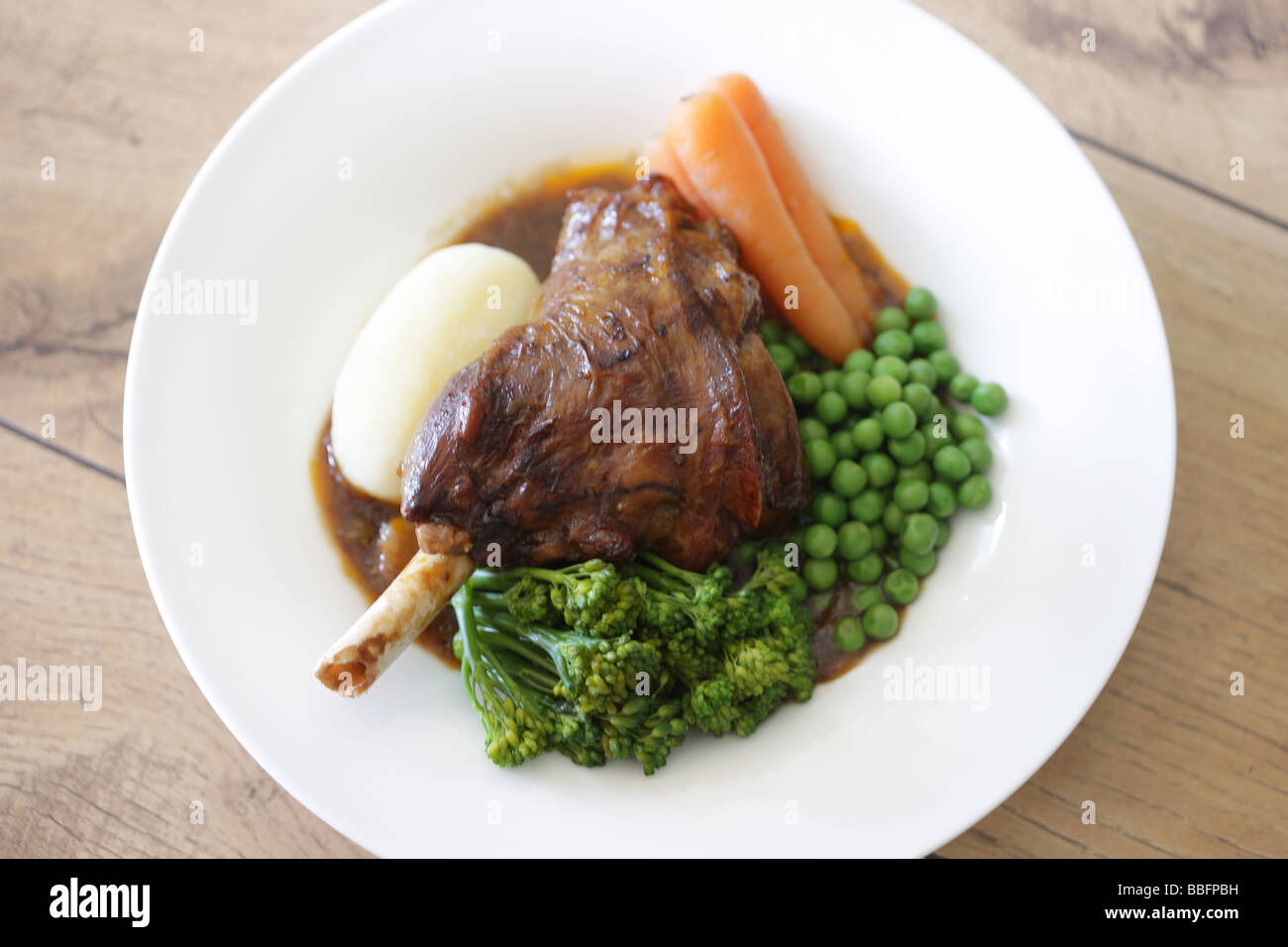 Leg Of Lamb With Vegetables Stock Photo - Alamy