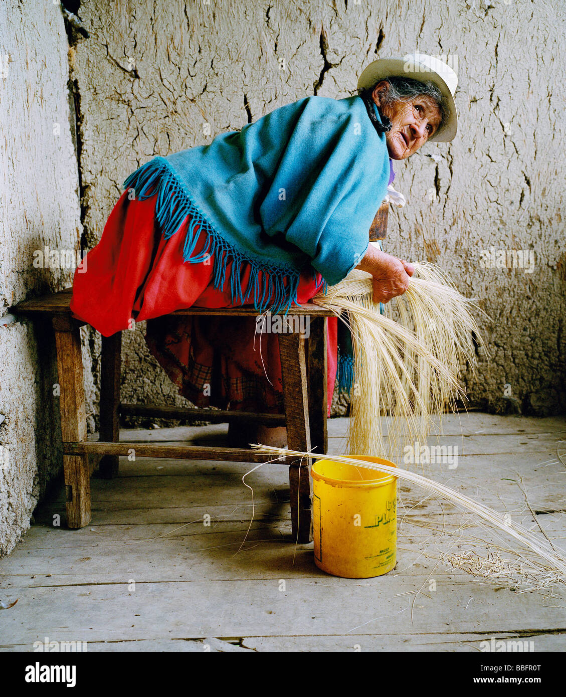 85 years old Alzira De Jesus Gonzales has been weaving panama hats since she was seven. Paute, Ecuador. Stock Photo