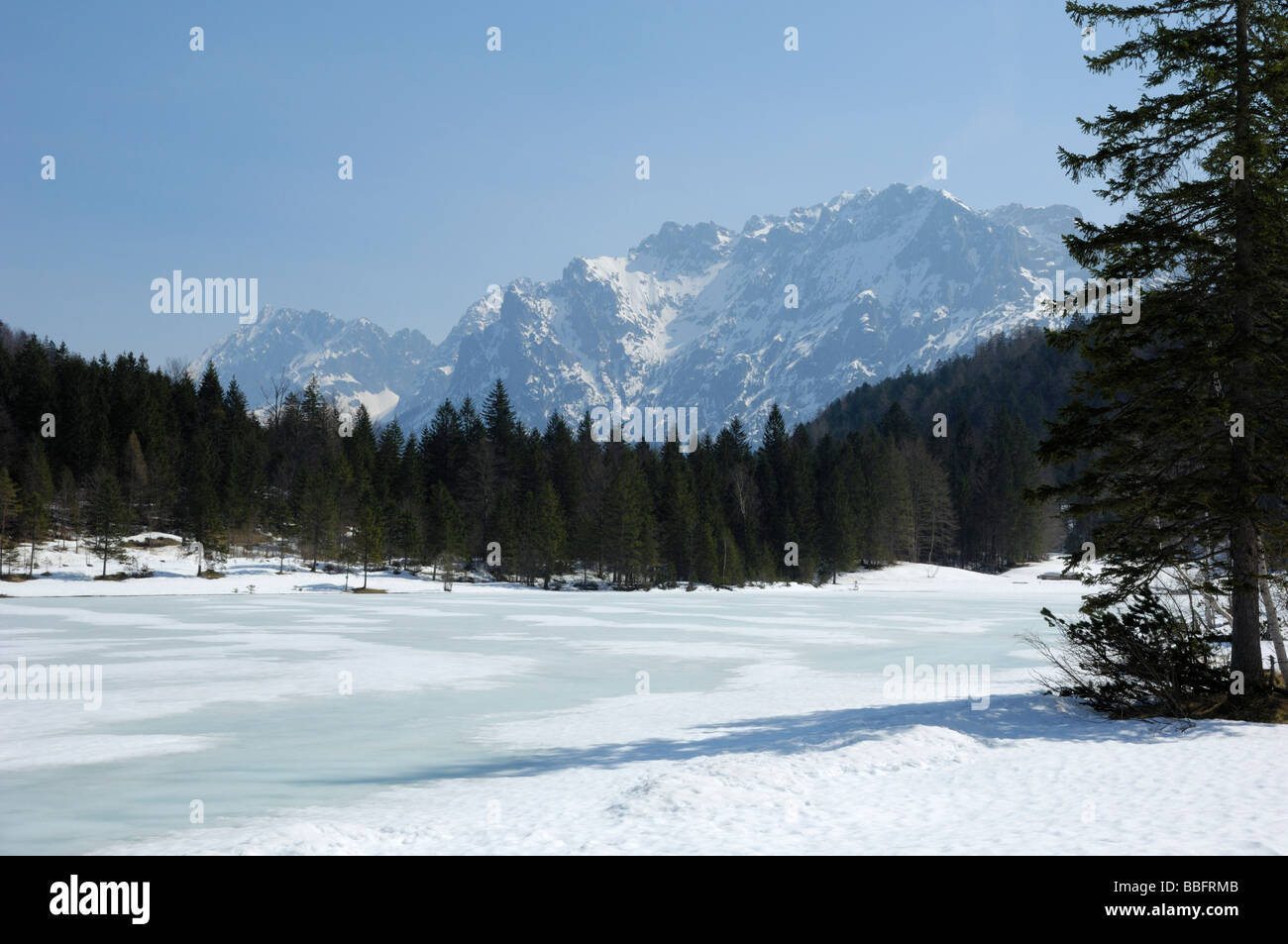 Ferchensee frozen in early spring, near Mittenwald, Bavaria, Germany Stock Photo