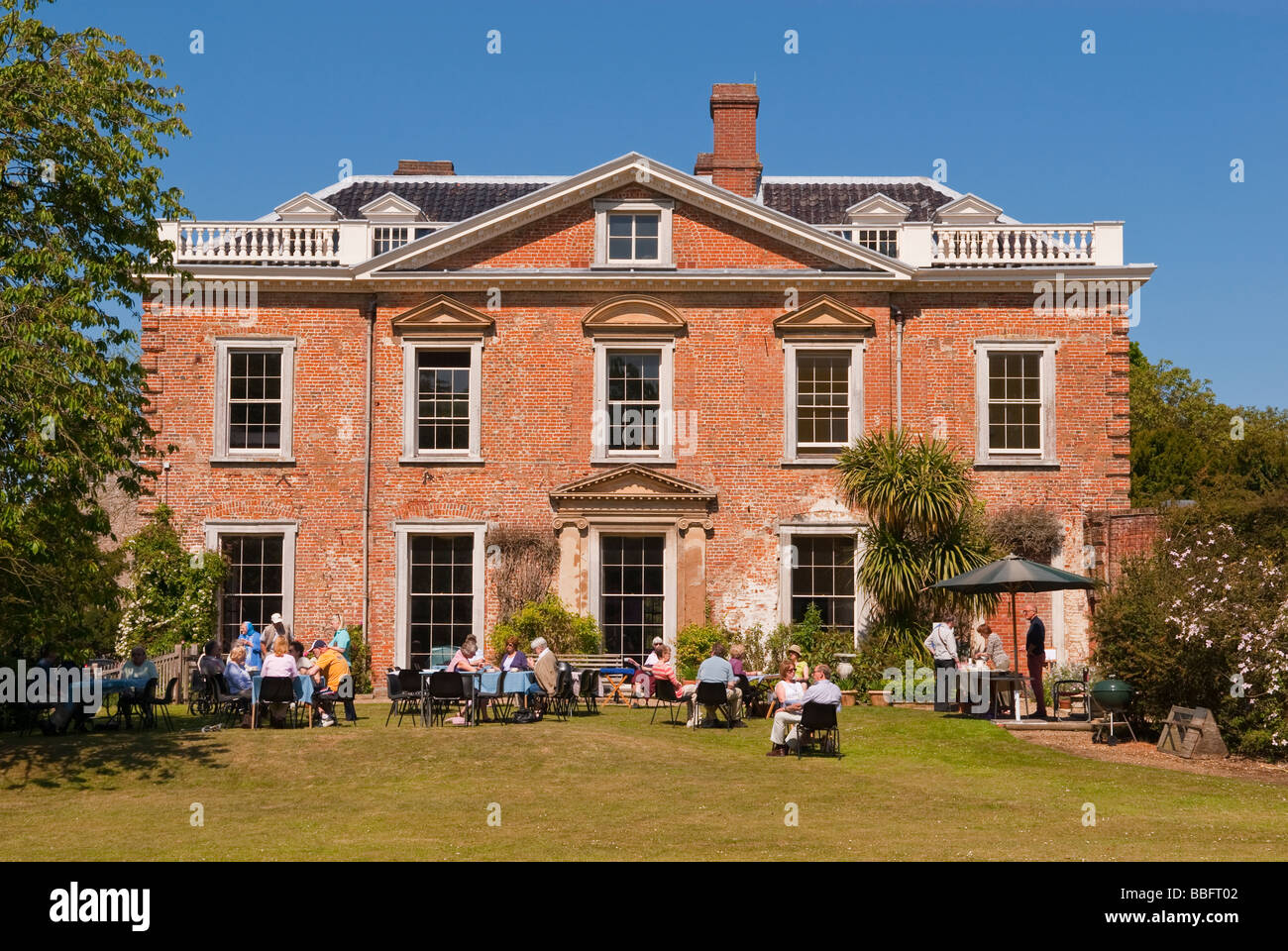 The open gardens of Sotterley Hall in Suffolk,Uk,a privately owned grand country mansion house in the countryside Stock Photo