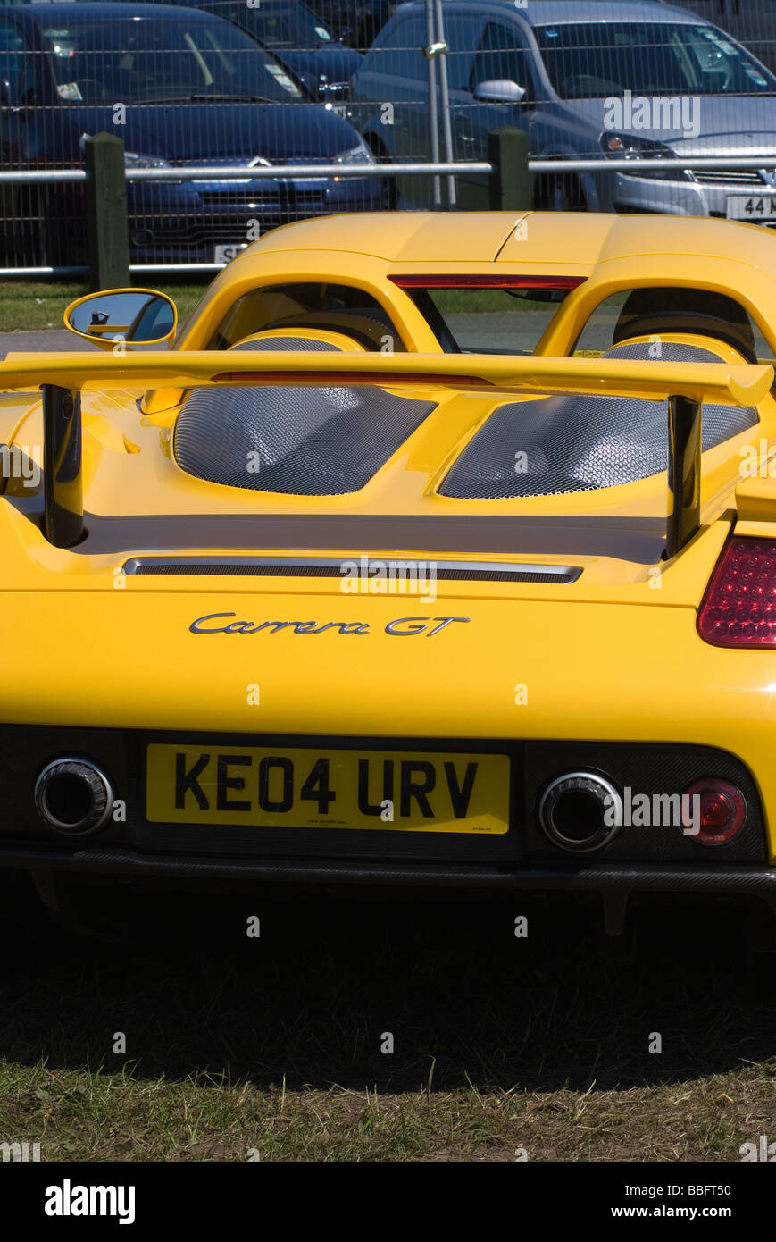 Rear View of a Bright Yellow Porsche Carrera GT Sports Car at Oulton Park  Motor Racing Circuit Cheshire England United Kingdom Stock Photo - Alamy
