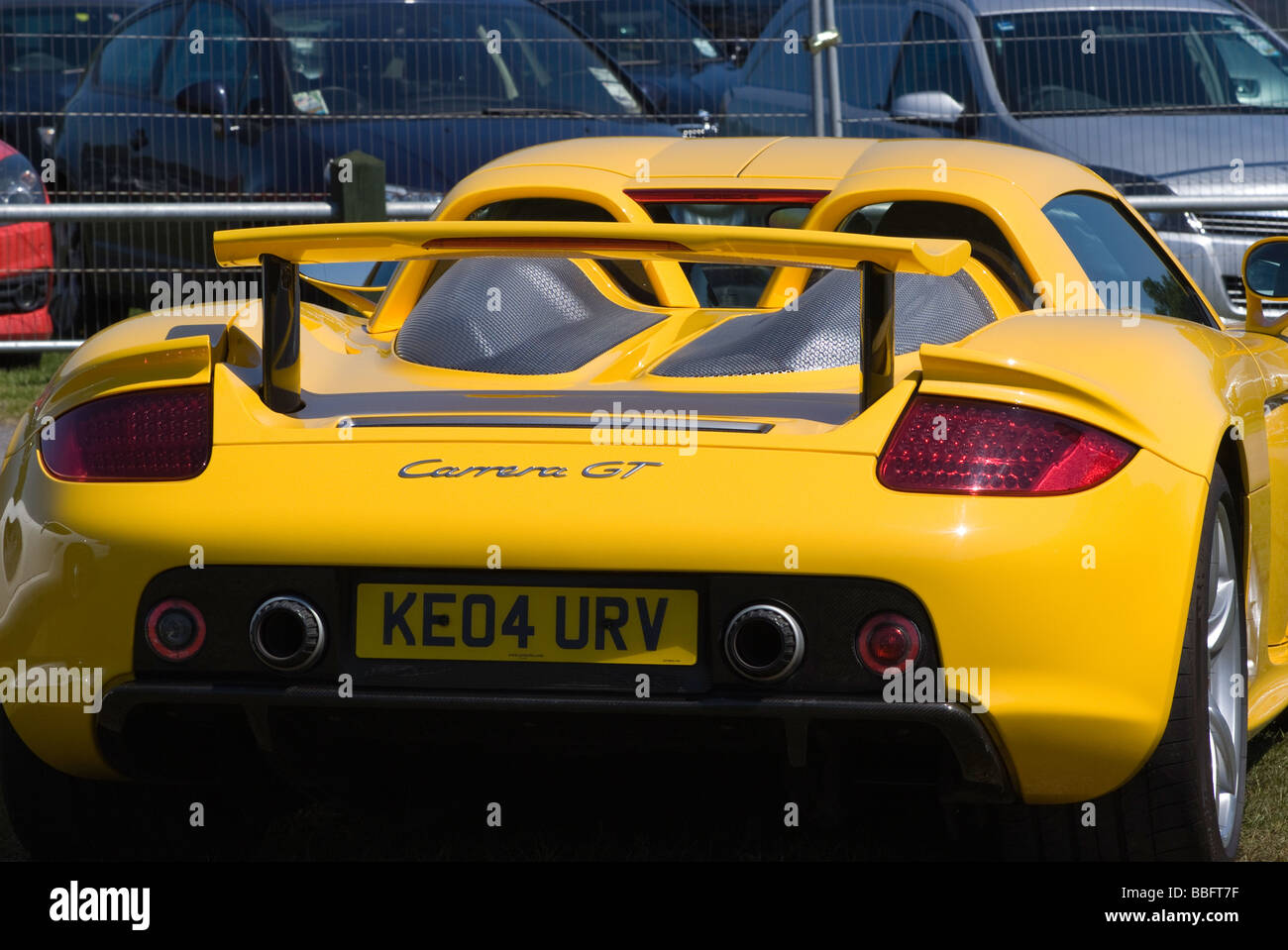 Rear View of a Bright Yellow Porsche Carrera GT Sports Car at Oulton Park  Motor Racing Circuit Cheshire England United Kingdom Stock Photo - Alamy