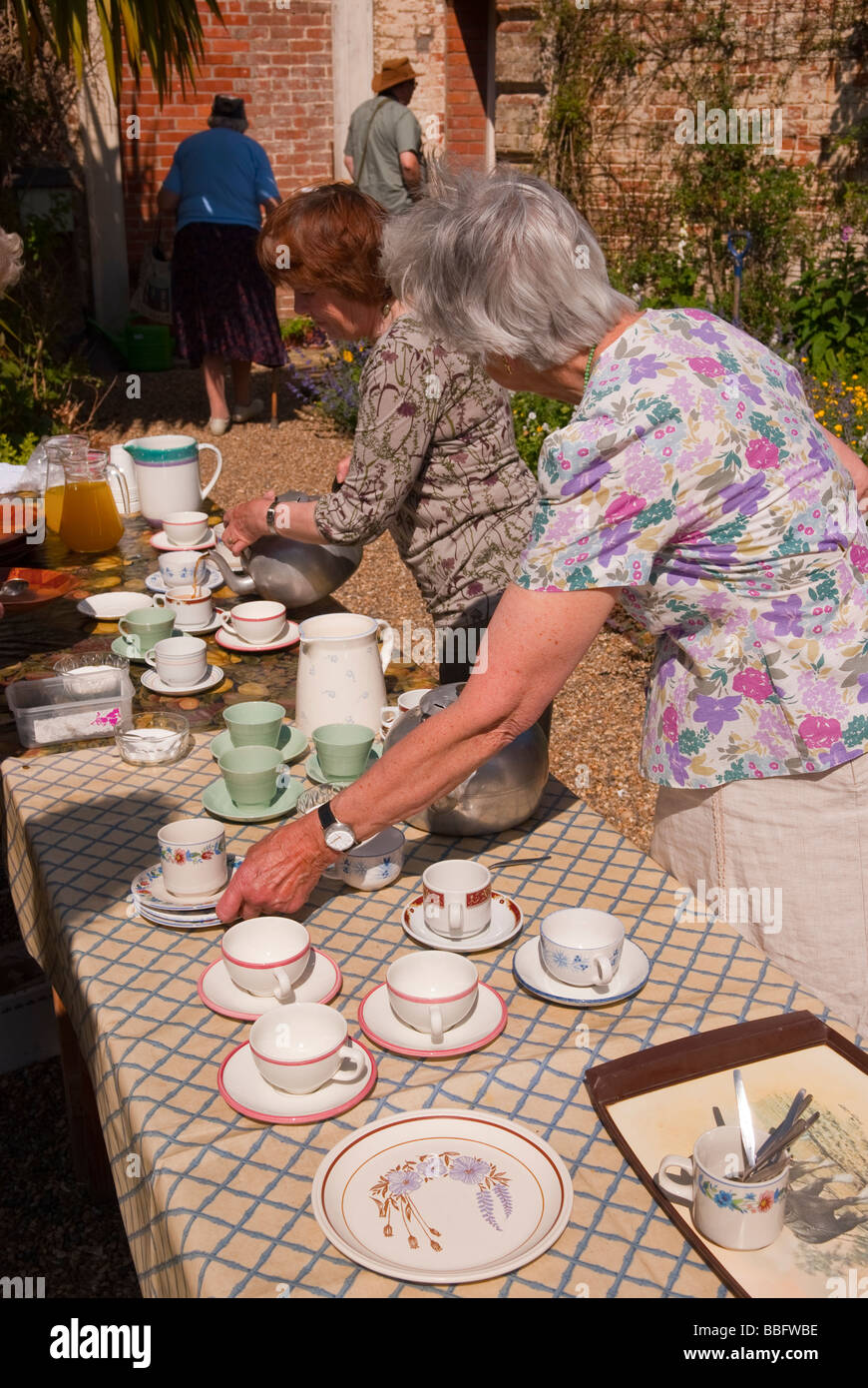 Visitors having refreshments at a open garden event at a uk country