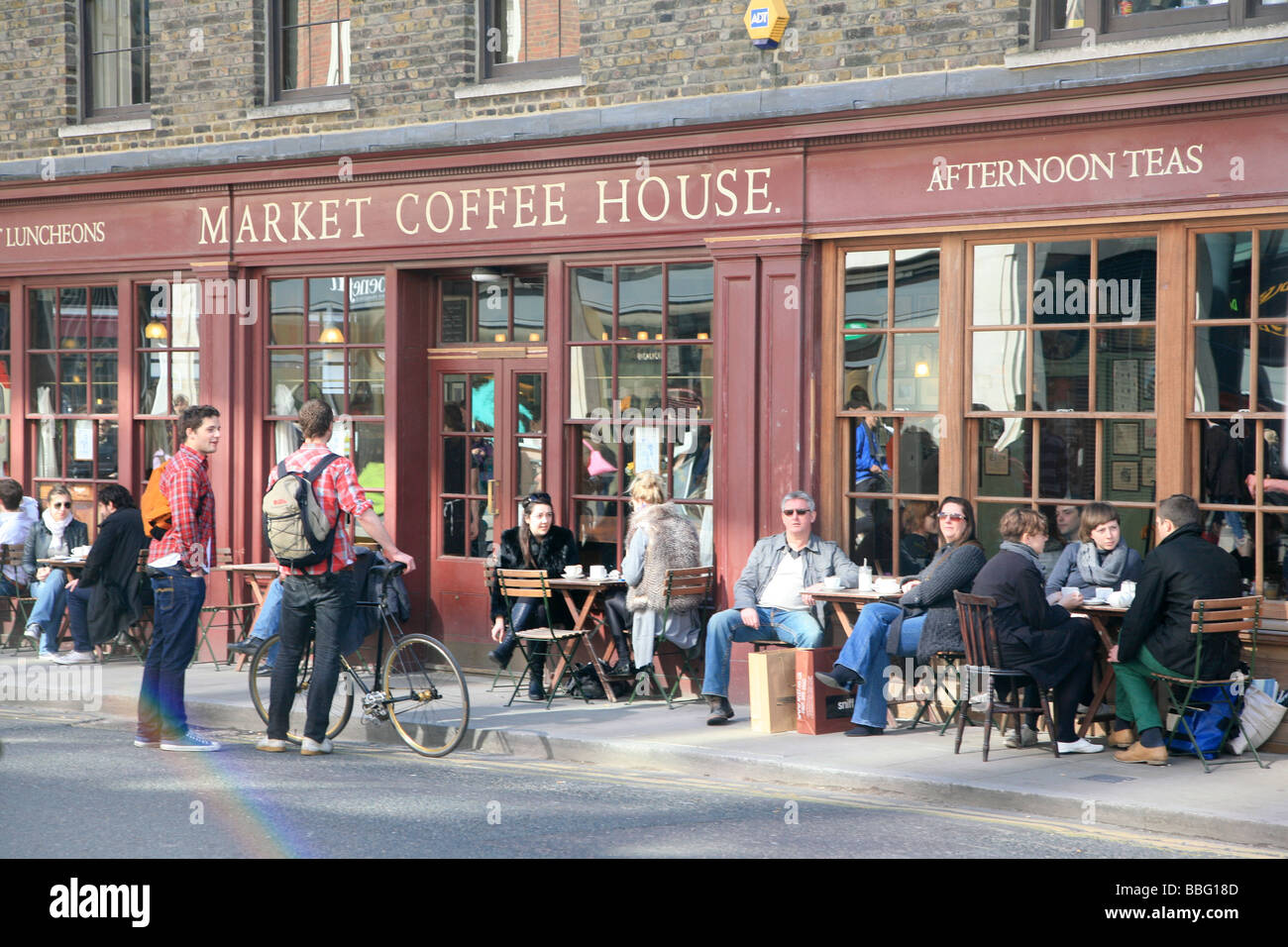 People having coffee at the Market Coffee House, Brick Lane