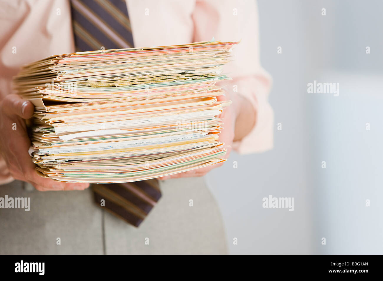 Businessman with paperwork Stock Photo