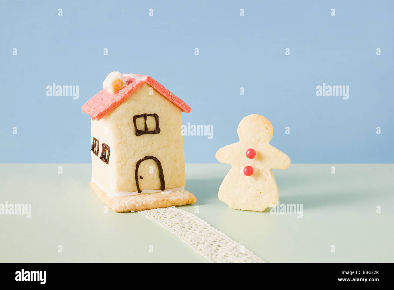 Biscuit house and gingerbread woman Stock Photo