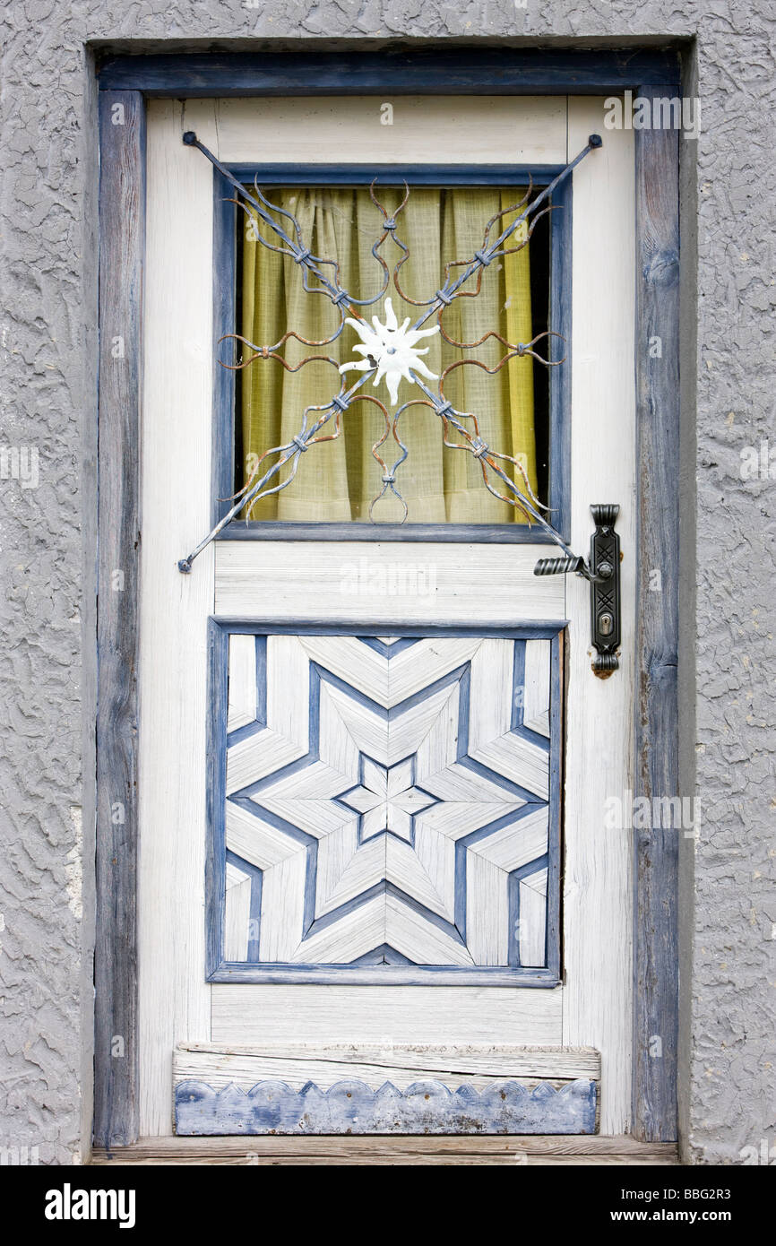 Farm house door with wood inlays, North Tyrol, Austria, Europe Stock Photo
