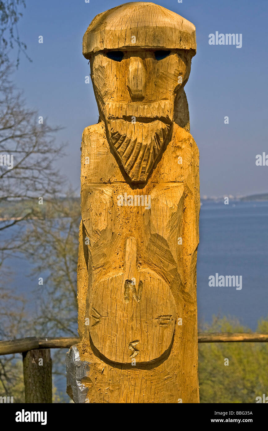 Wood sculpture on the edge of the road along the Havel river in Berlin, Germany, Europe Stock Photo