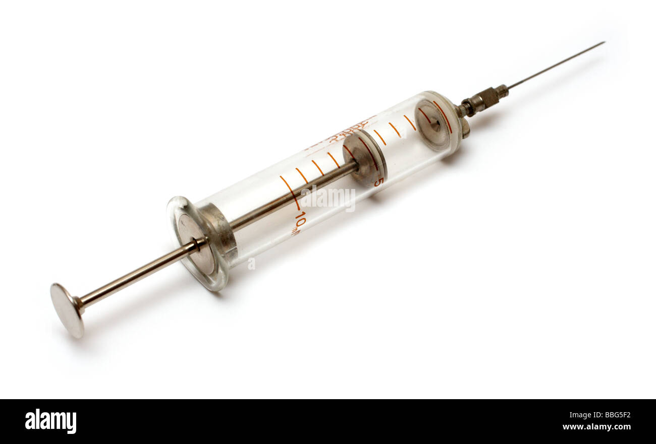 old injecting syringe on white background Stock Photo
