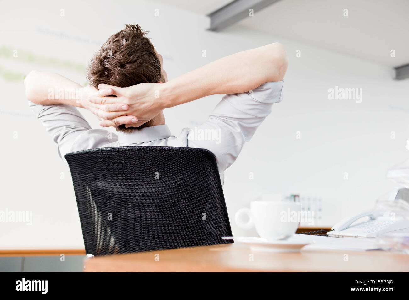 Man Leaning Back In Chair Stock Photo Alamy man-leaning-back-in-chair-stock-photo-alamy