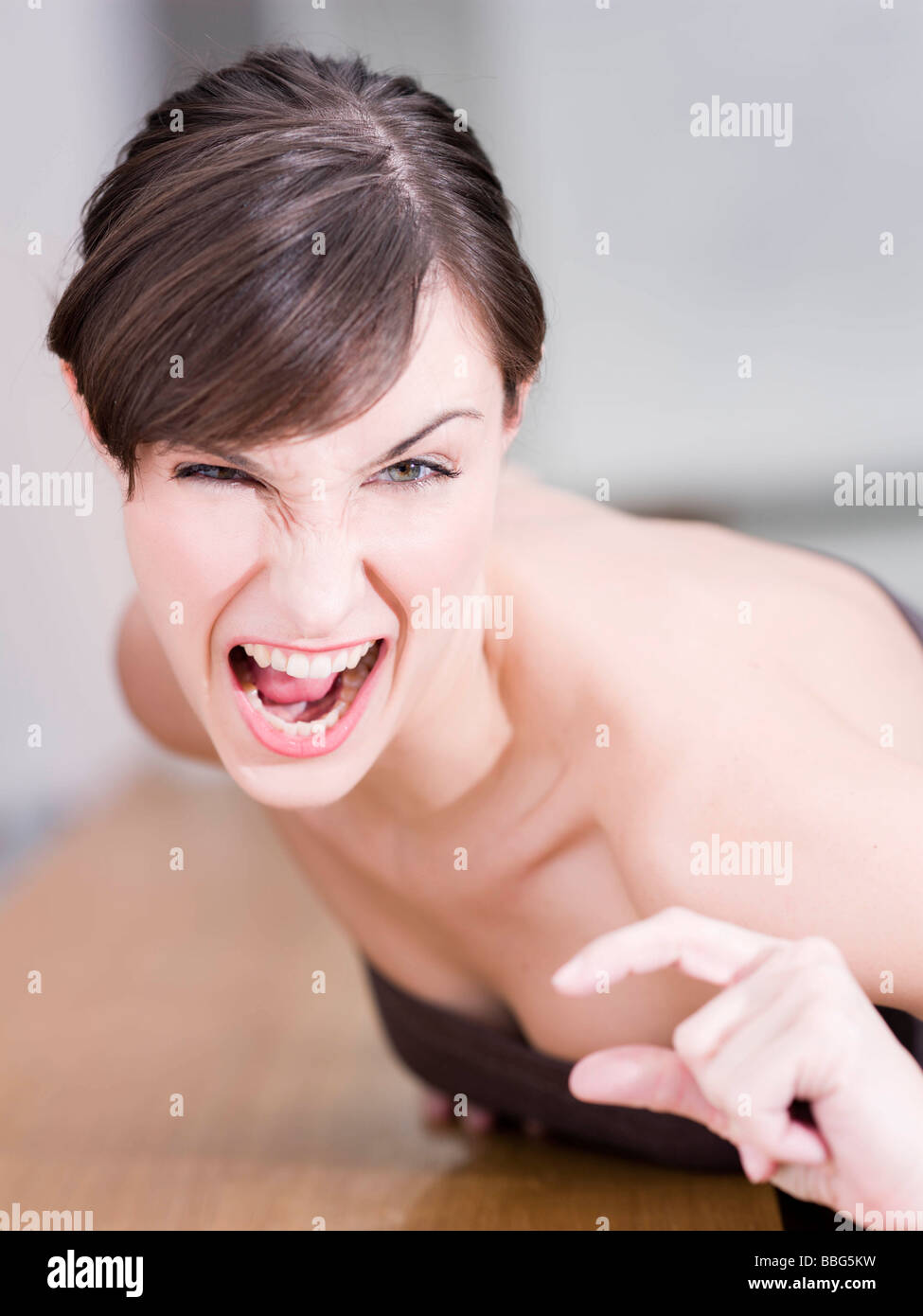 Woman making a gesture Stock Photo