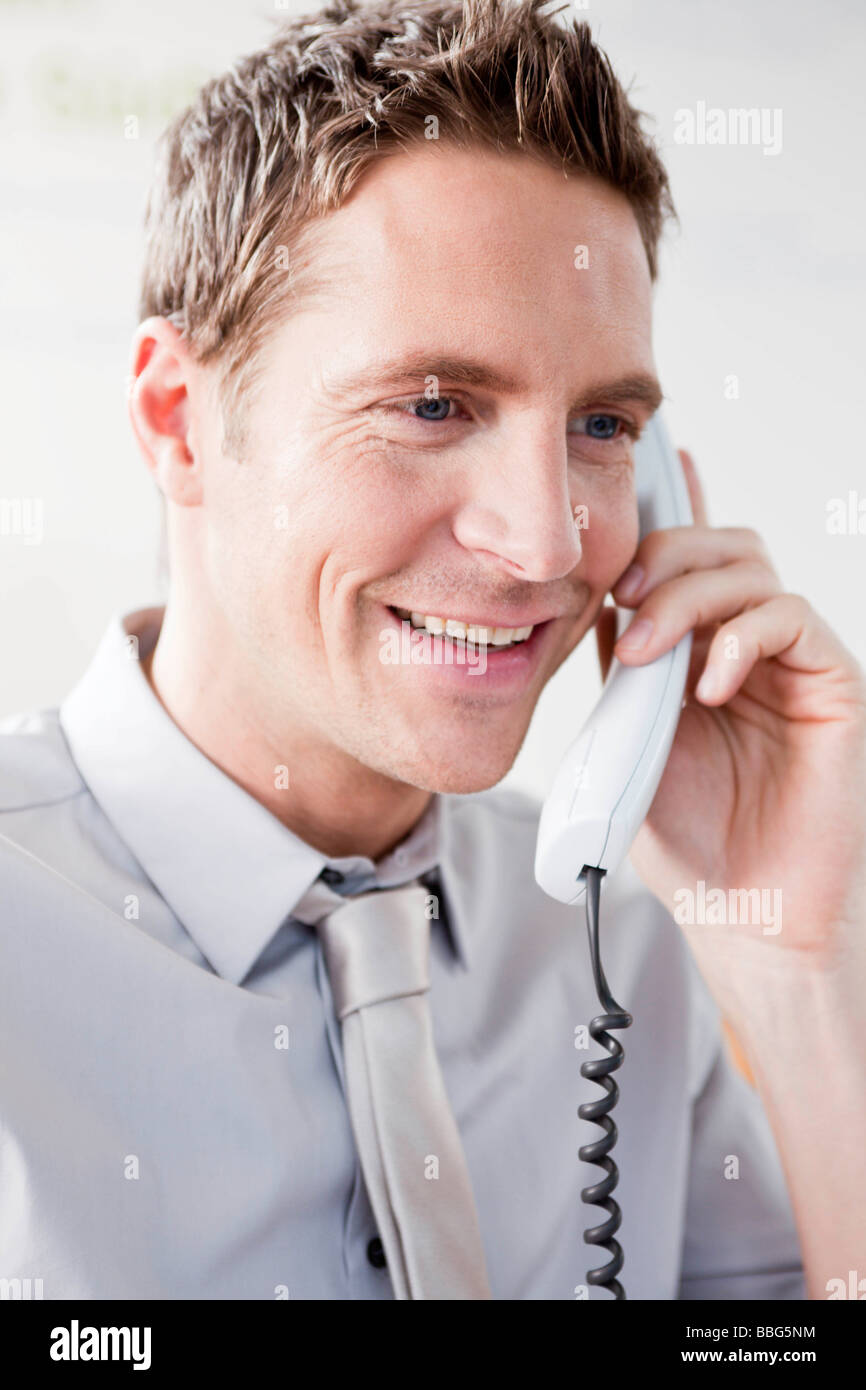 Telephone smiling listening man hi-res stock photography and images - Alamy