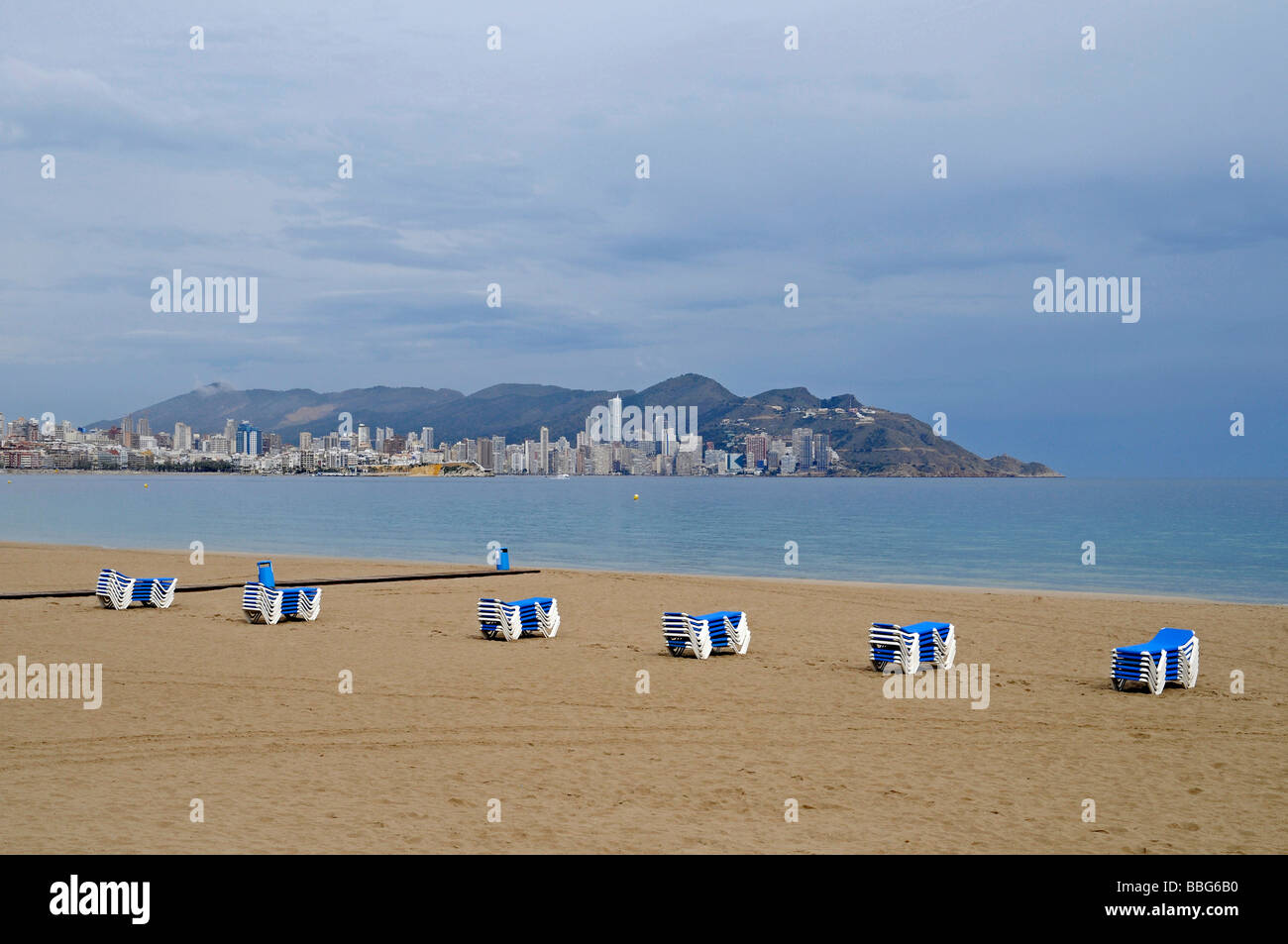 Empty beach, deck chairs, dark clouds, bad weather, crisis, Playa de Poniente, Ponent, beach