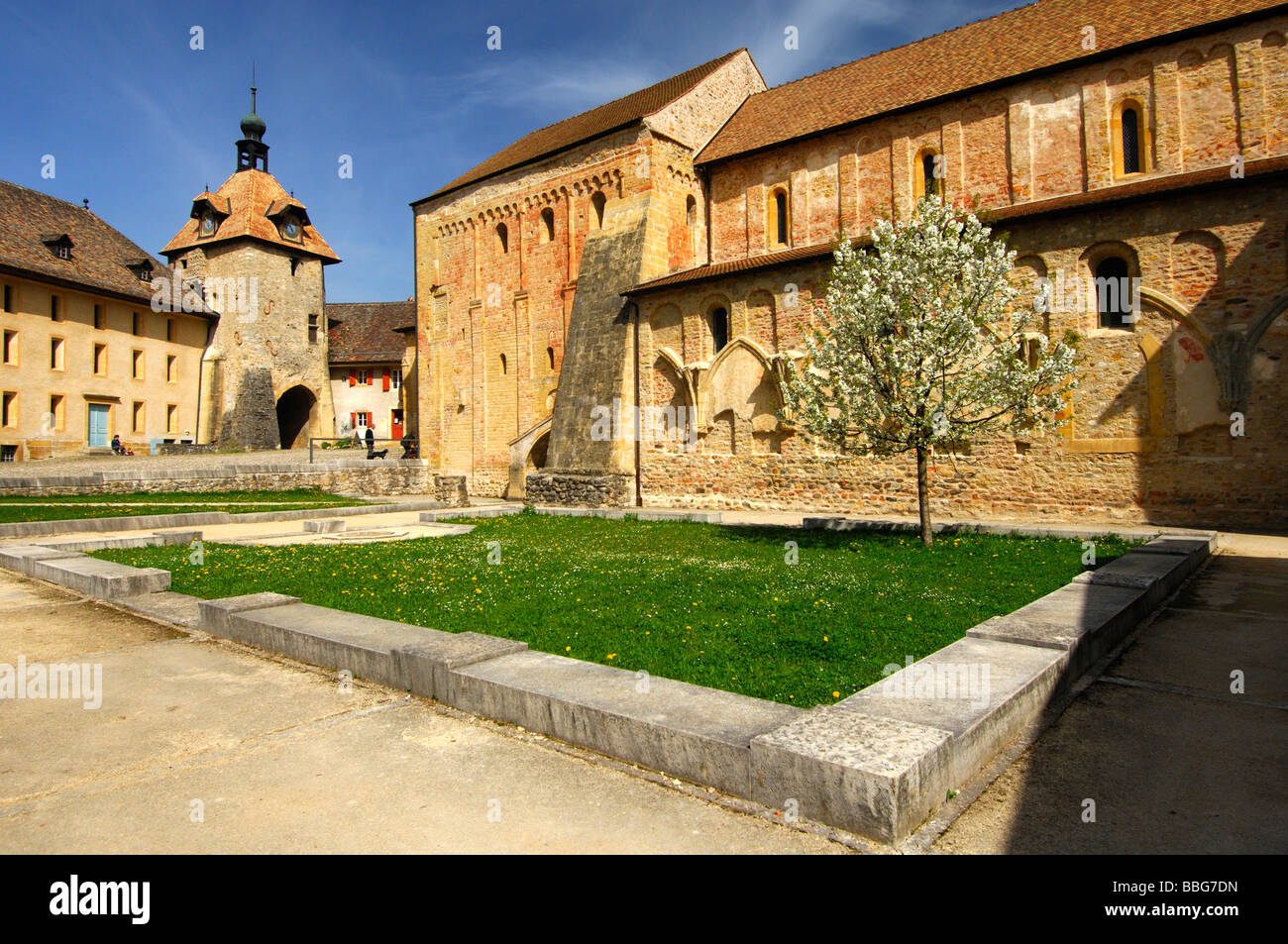 Bell tower and nave of the Romanesque abbey of Romainmoitier, Vaud, Switzerland, Europe Stock Photo