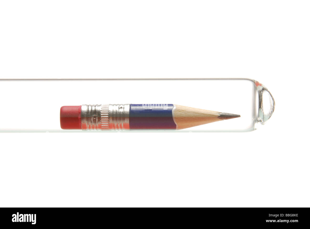 Sharpened-down pen in a test tube, symbolic of a lot of work Stock Photo
