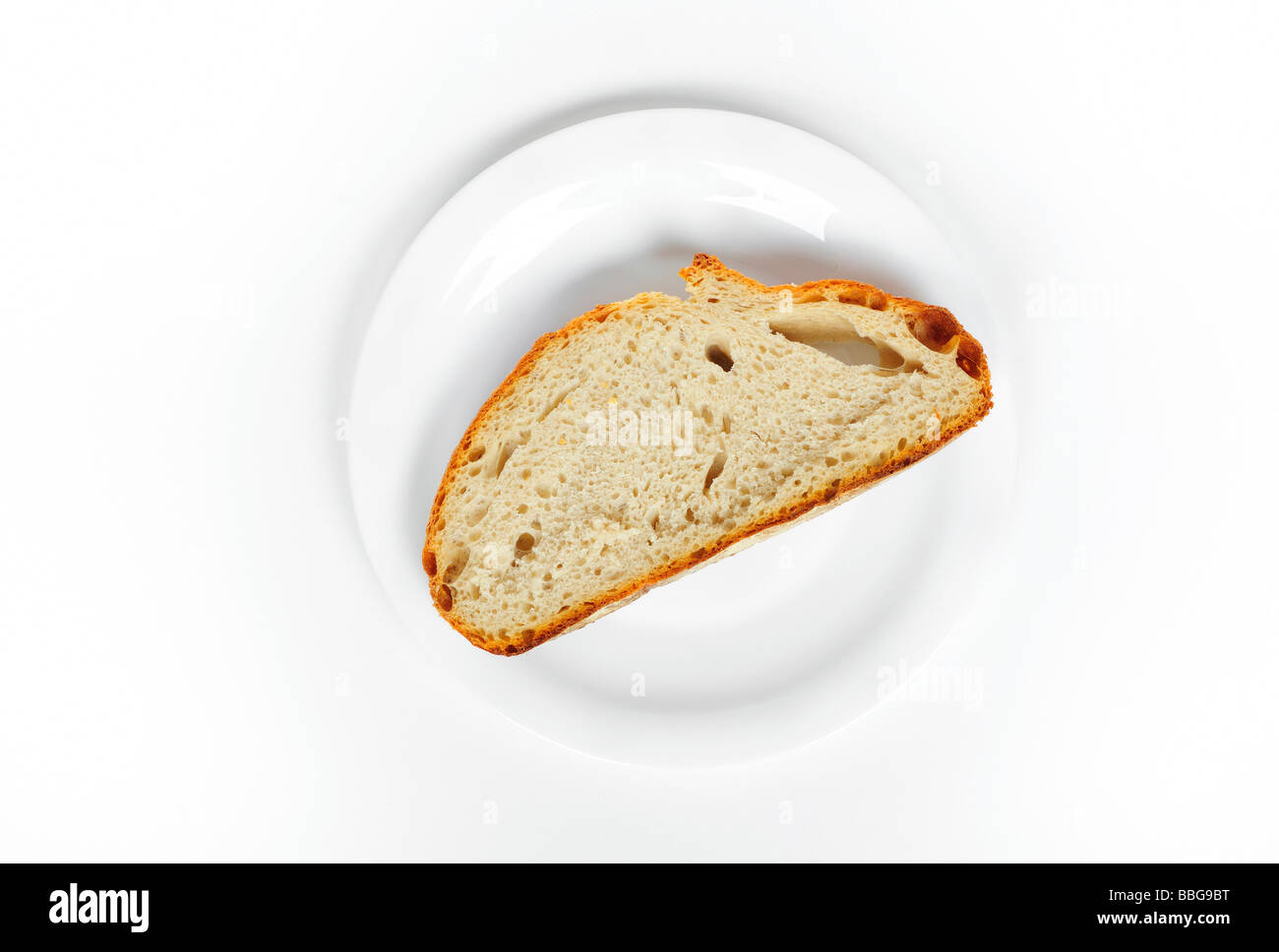 A slice of bread on a plate Stock Photo