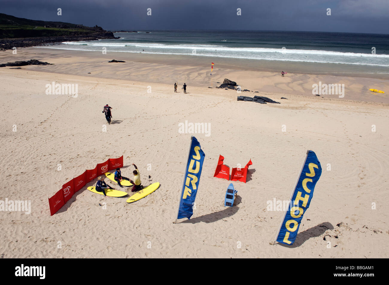 Surf School instructer and novices on Porthmeor Beach in 'St Ives',Cornwall Stock Photo
