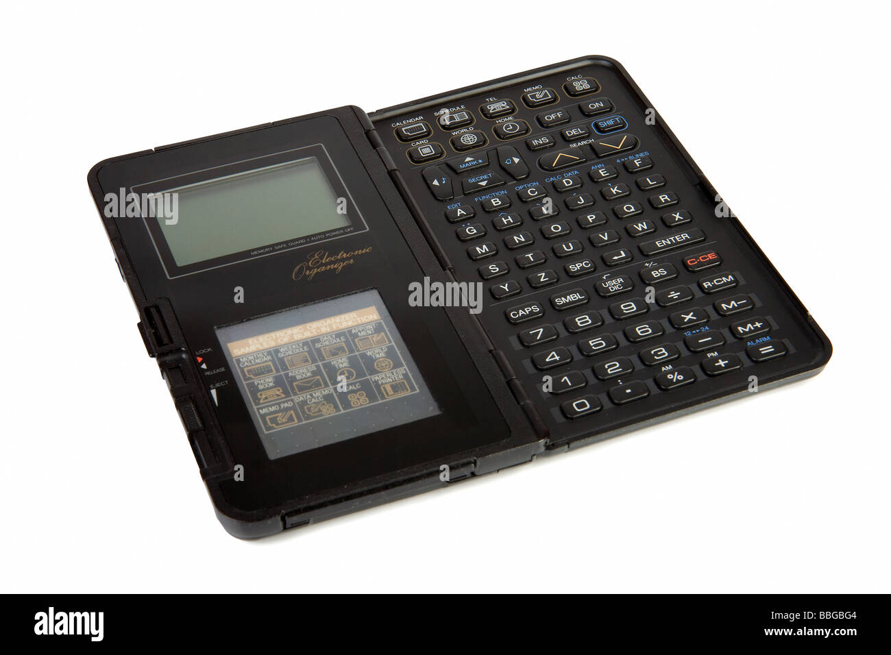 Old style personal electronic organizer Isolate on white Stock Photo