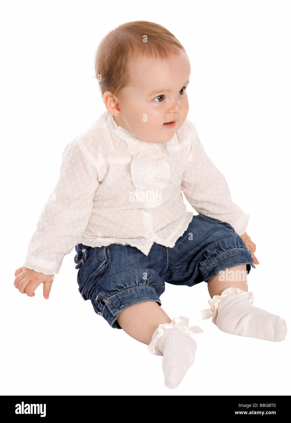 Cute baby girl looking up Stock Photo