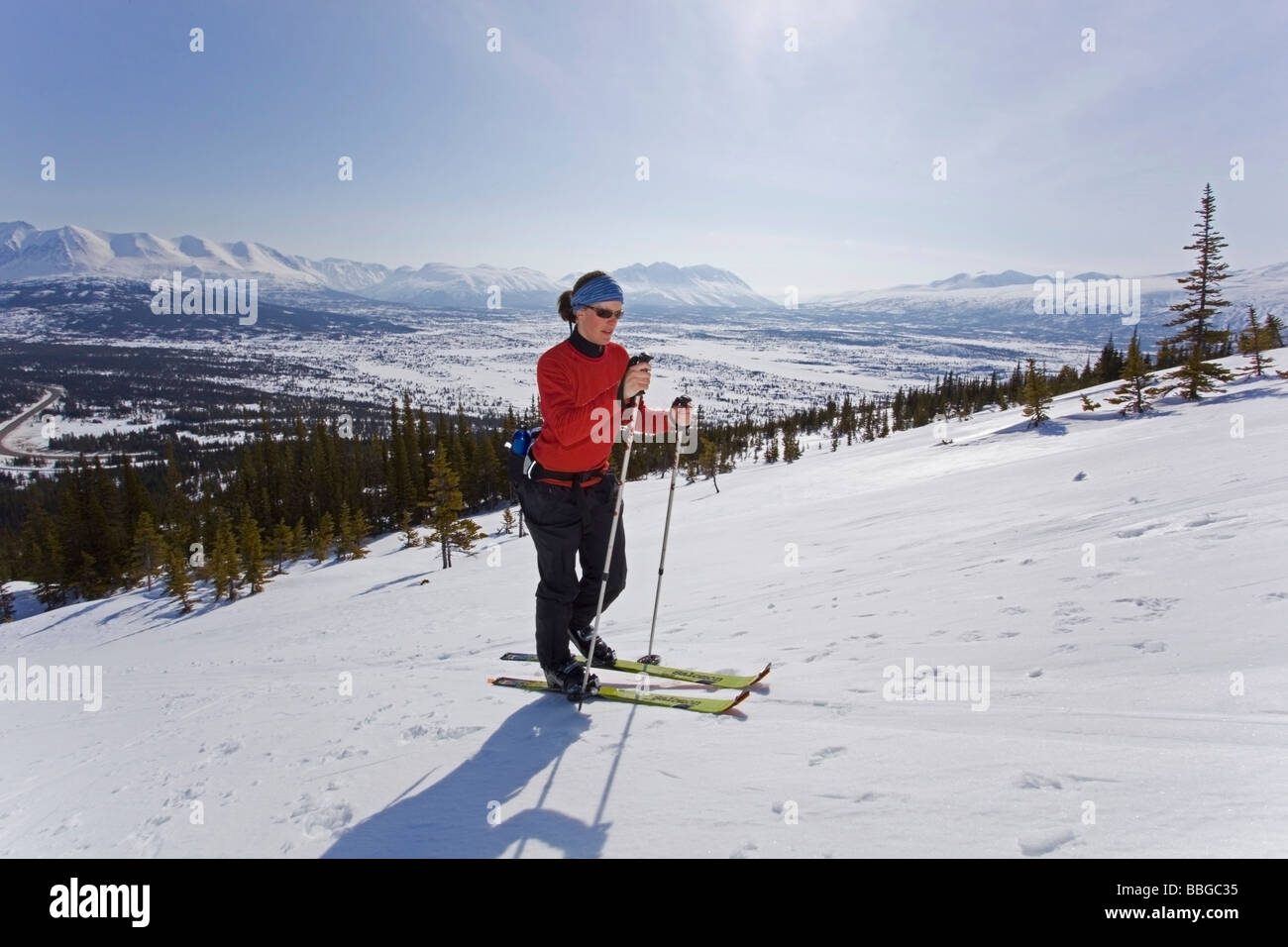 Young woman ski touring, telemark skiing, Log Cabin, White Pass