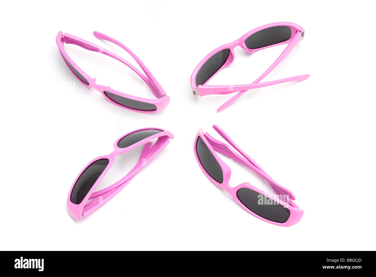 Four pairs of toy sunglasses arranged on white background Stock Photo