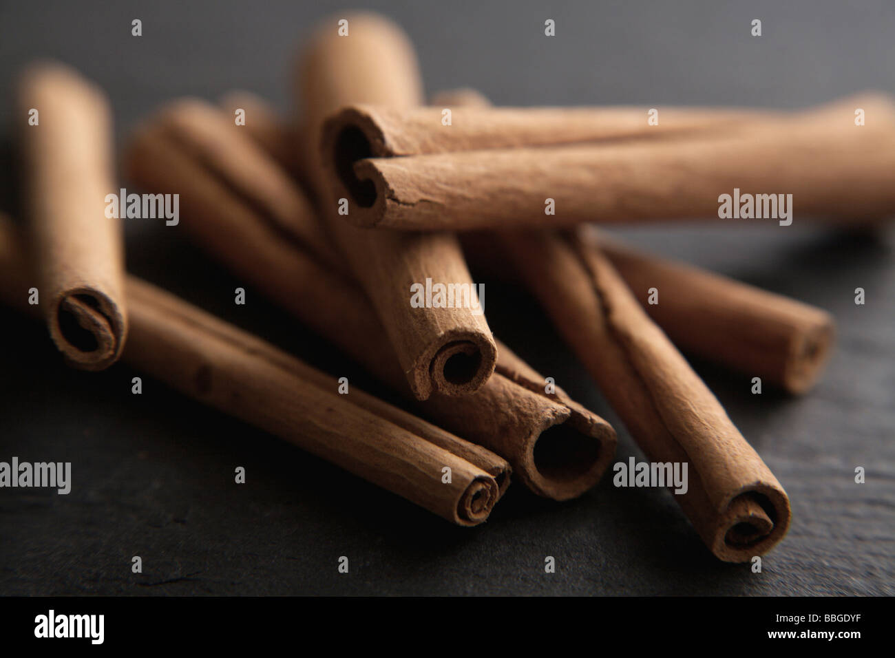 Cinnamon sticks on a slate Stock Photo