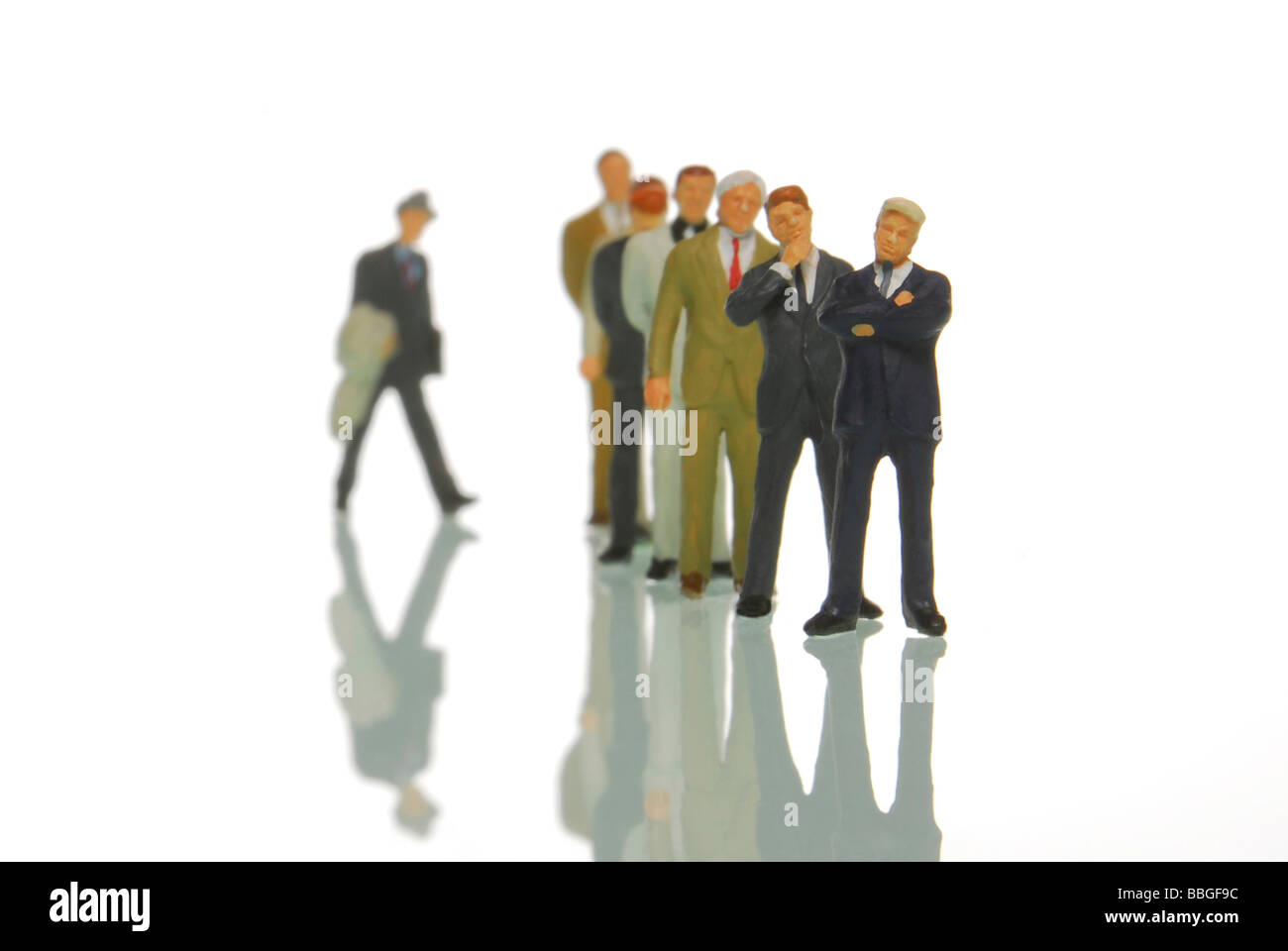Manager figurines in a queue, symbolic image for job application Stock Photo