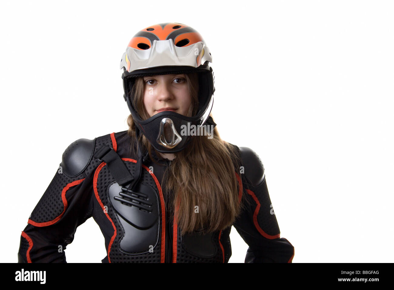 Extream girl in body armour with full face helmet isolated Stock Photo