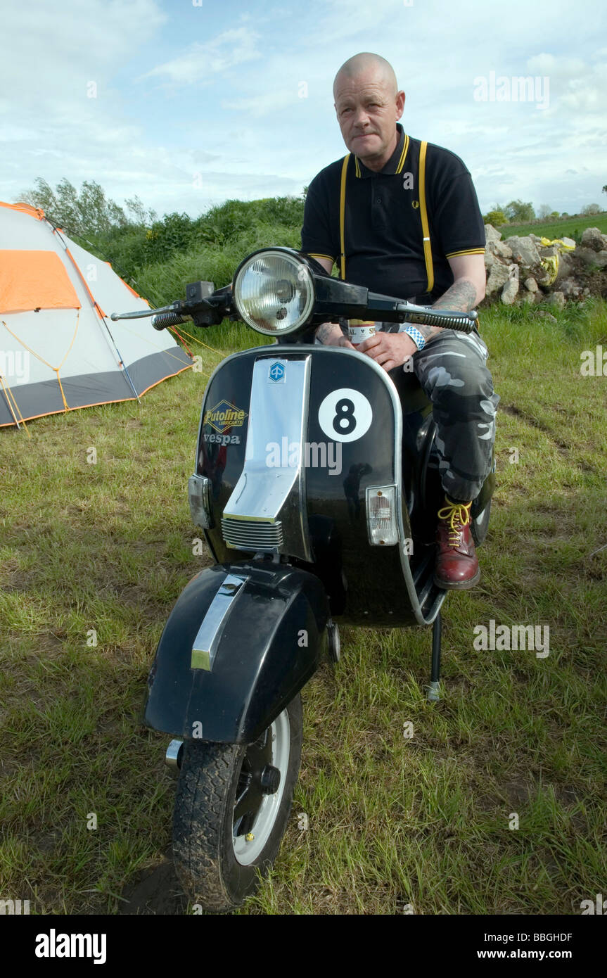 Skinhead on scooter in festival campsite at the Northern Soul Modernist Weekender, Newton upon Derwent, York, North Yorkshire Stock Photo