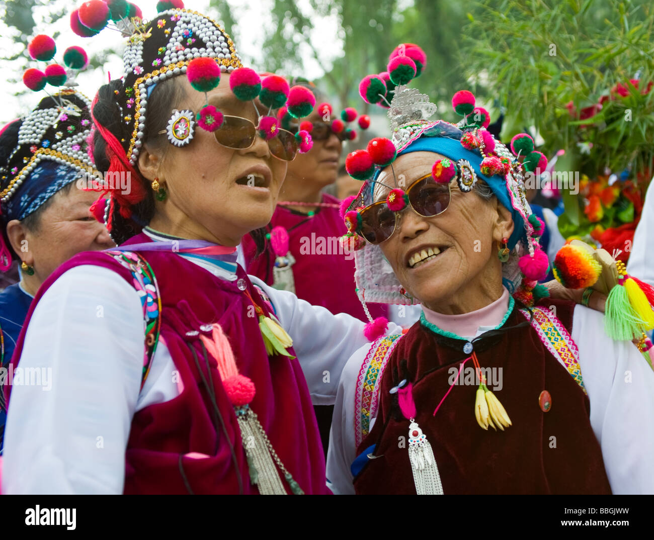 Two Women performing at the Bai Raosanling Festival, Dali, Yunnan Province, China Stock Photo