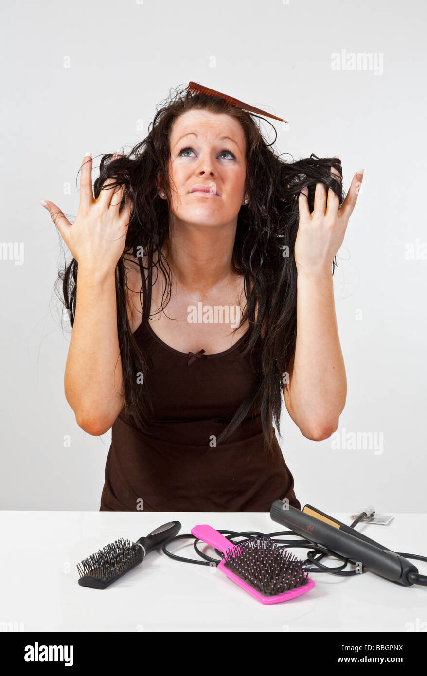 Attractive model having a bad hair day. Stock Photo