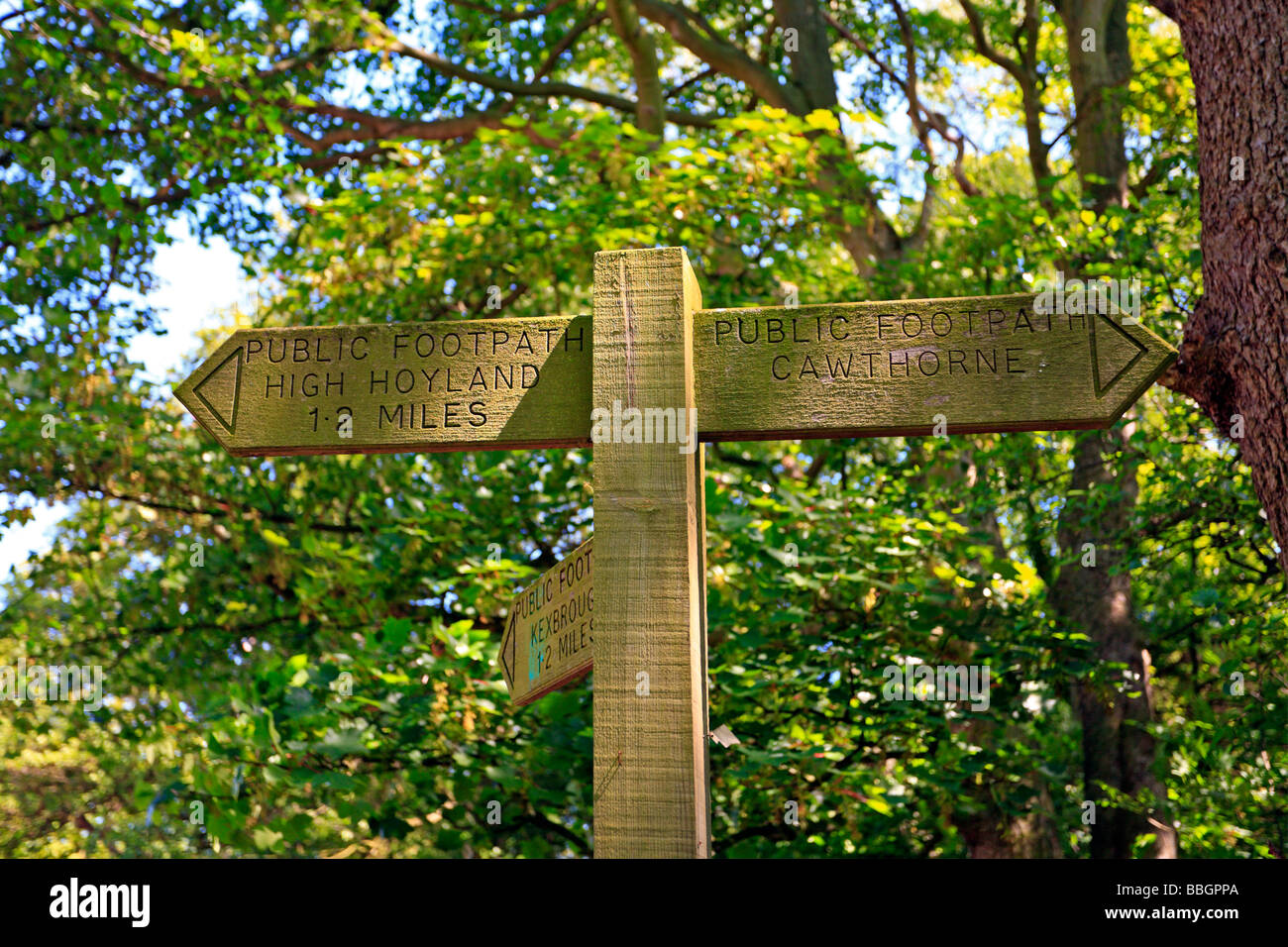 Wooden way marker post at Cawthorne, Barnsley, South Yorkshire, England, UK. Stock Photo