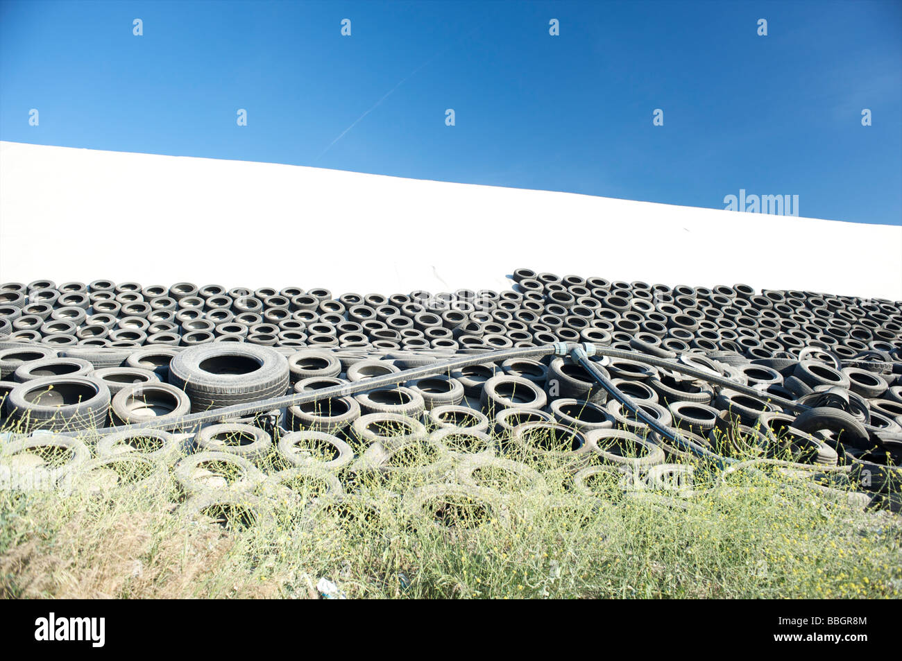 Used tires in a garbage dump Stock Photo Alamy