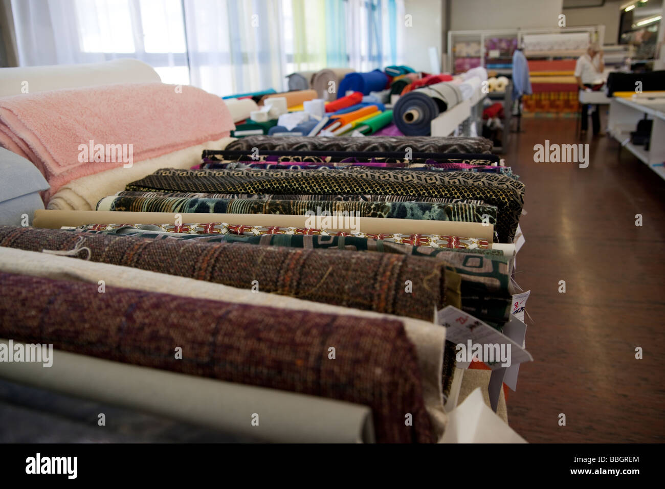 Bolts, rolls of fabric at a fabric store. Charles Lupica Stock Photo