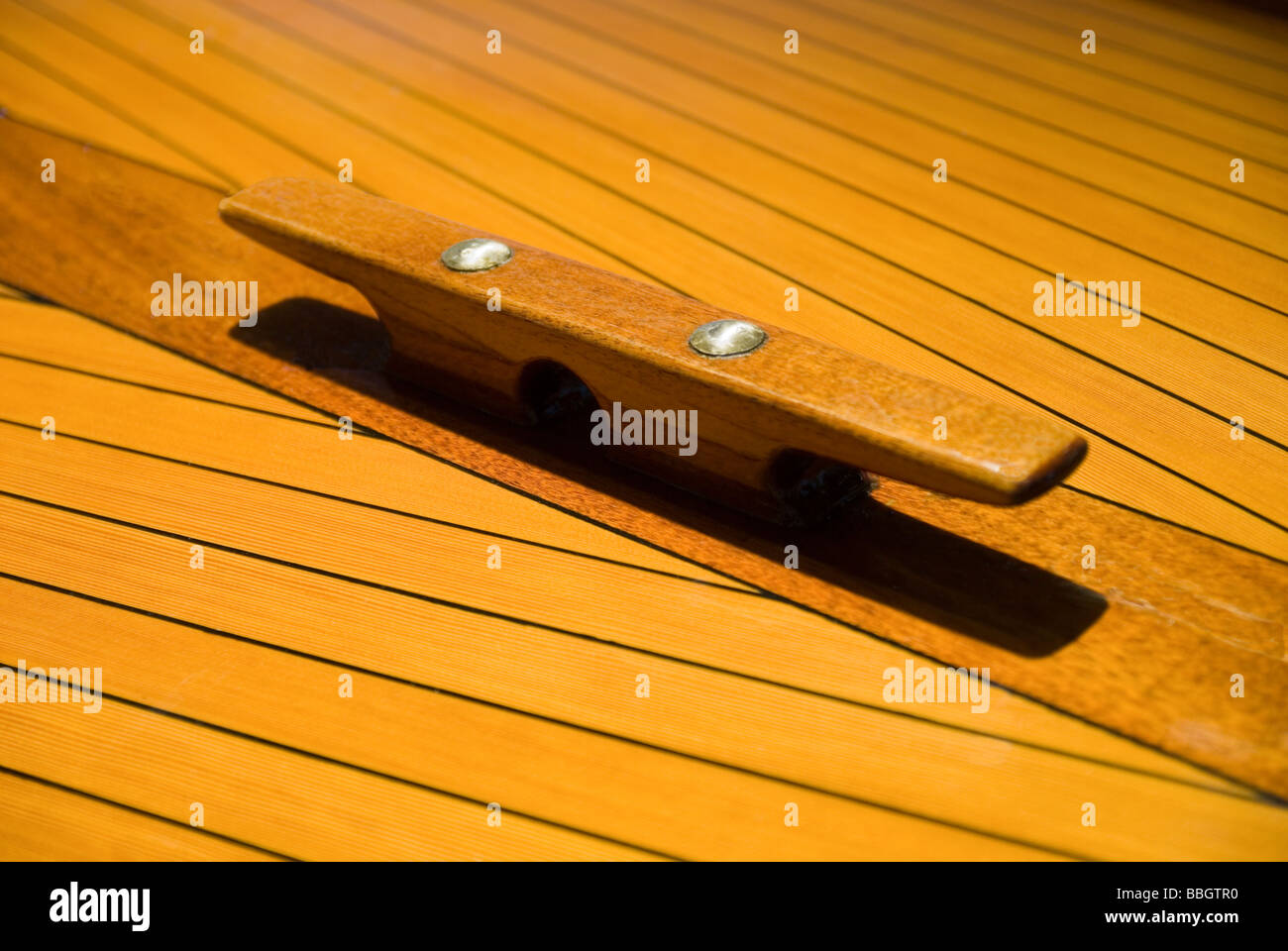 cleat of wood on a boat Stock Photo Alamy