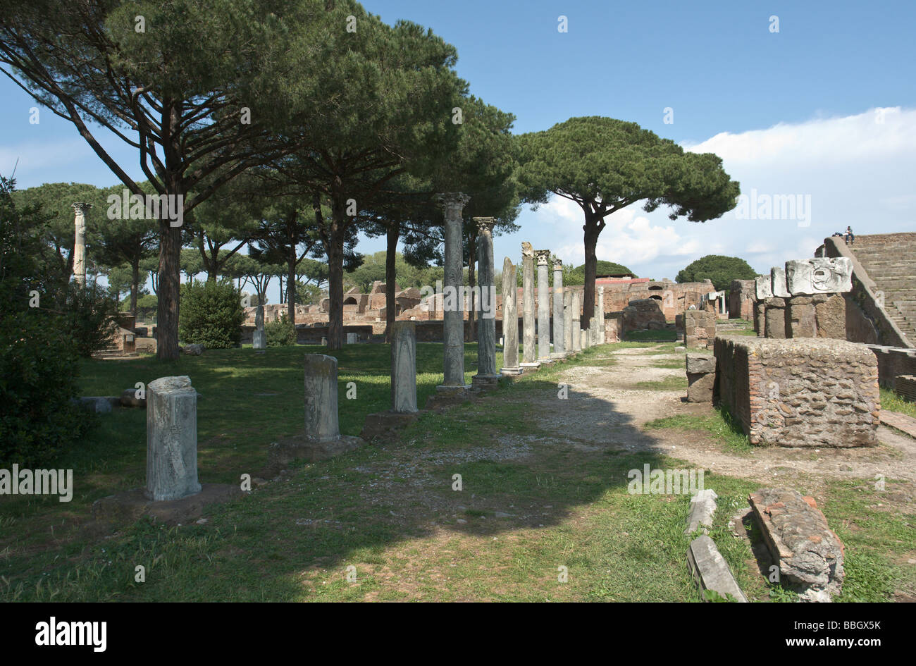 The colonnade separating the Theatre (right) from the Piazzale delle Corporazioni (left) in Ostia Antica, Rome. Stock Photo