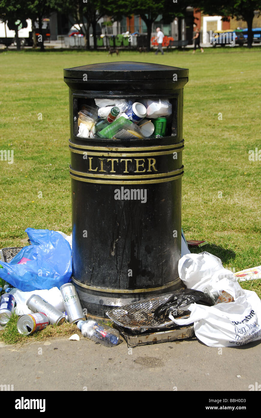 Litter bin with rubbish Stock Photo
