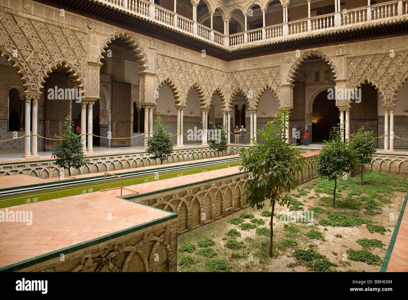 Courtyard of Las Doncellas in the Mudejar Palace of Los Reales Alcazares Seville Andalusia Spain Stock Photo