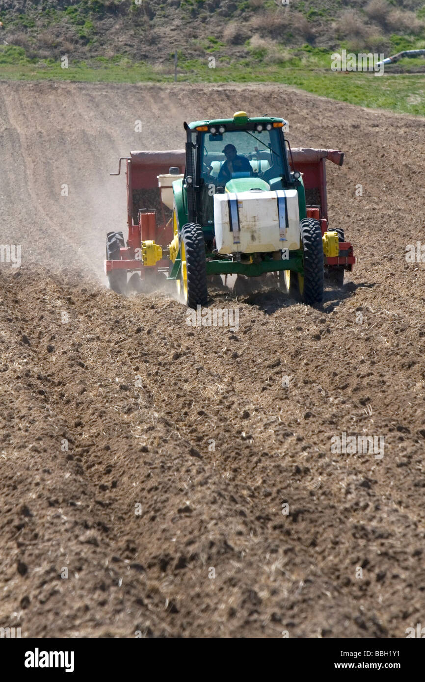Farmer planting potato crop in Canyon County Idaho USA Stock Photo
