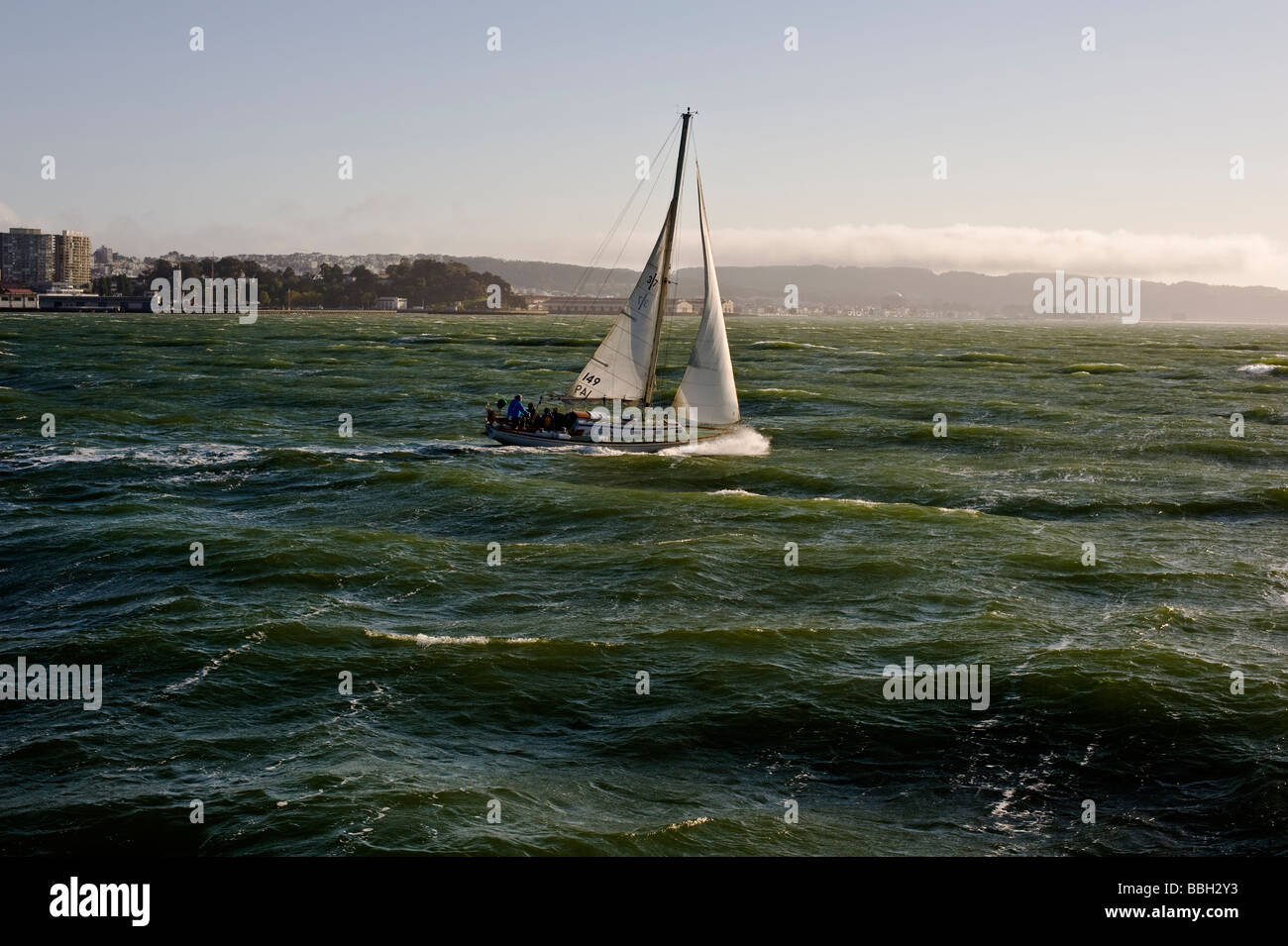 sailboat tacking into the wind in san francisco bay Stock Photo