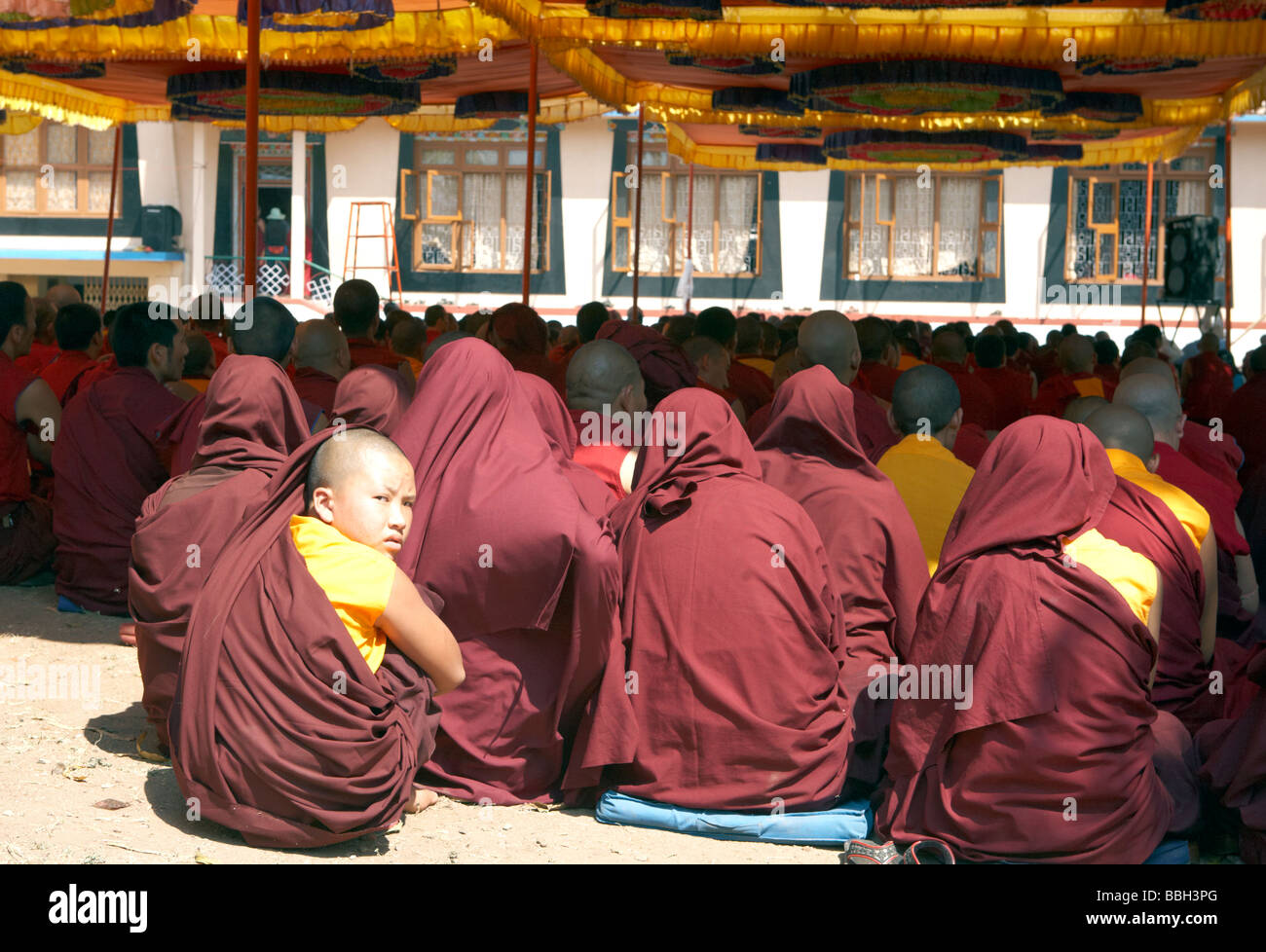 Buddhist Monks Hearing The Teachings Outside Sera Monastery Bylakuppe Koorg Karnataka India Stock Photo