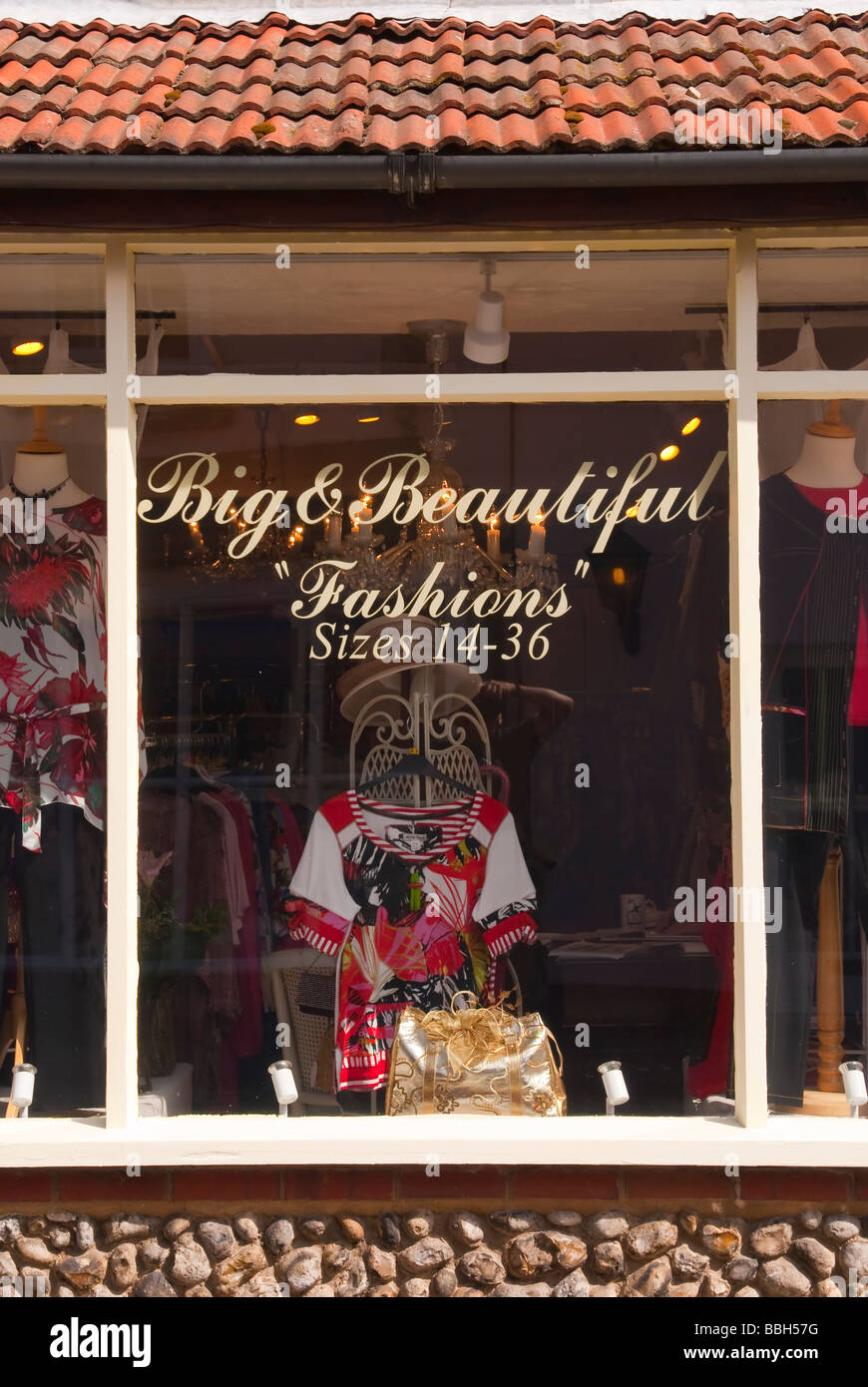 A clothing shop store called big & beautiful selling clothes and fashions catering for women who are big sizes in Holt in the Uk Stock Photo