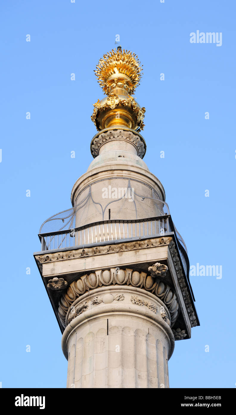 Gilded Urn of Fire and viewing platform on the Monument to the Great Fire of London England UK Stock Photo